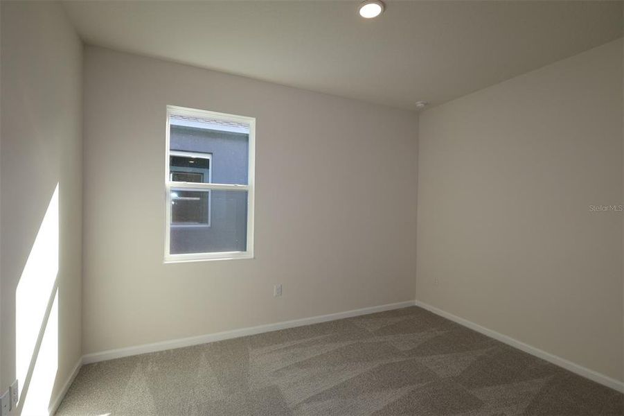 Spacious, unfurnished interior of a new home in Estates at Rivercrest, Sanford (Image 26).