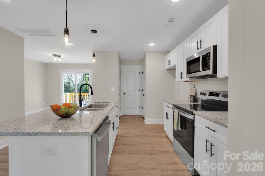 Well appointed kitchen designed for daily use.