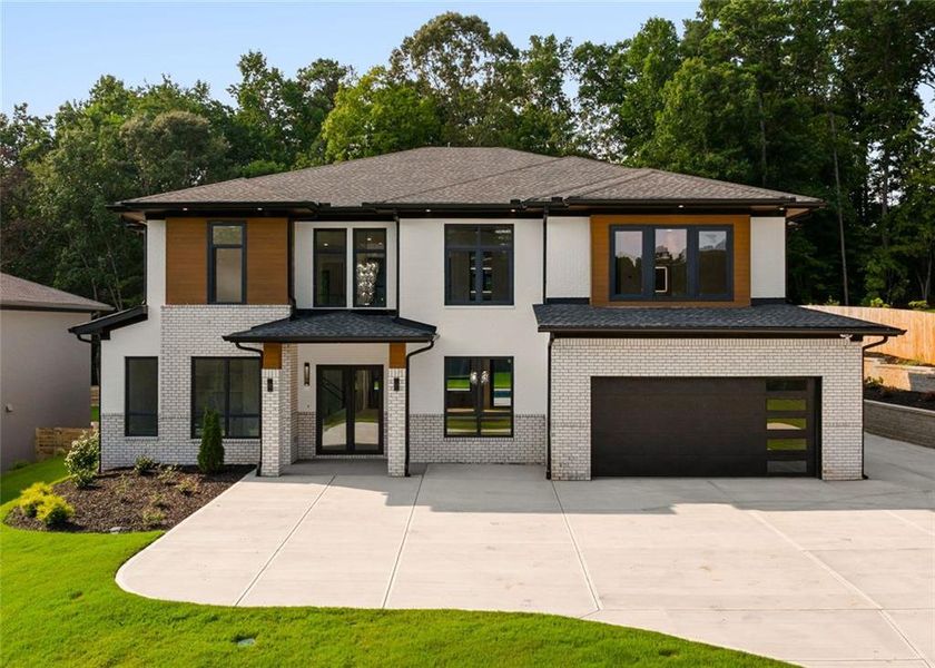 Front exterior of a new home in , Sugar Hill, GA, highlighting curb appeal (Image 32). Front exterior of a new home in , Sugar Hill, GA, highlighting curb appeal (Image 32).