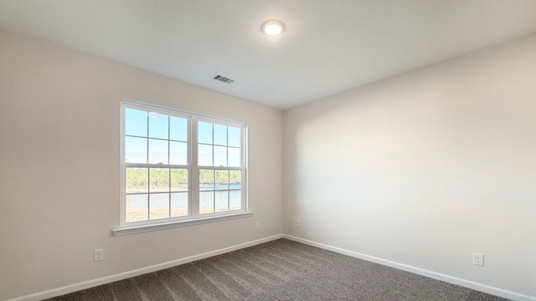 Spacious, unfurnished interior of a new home in Grand Reserve, Hinesville (Image 25).