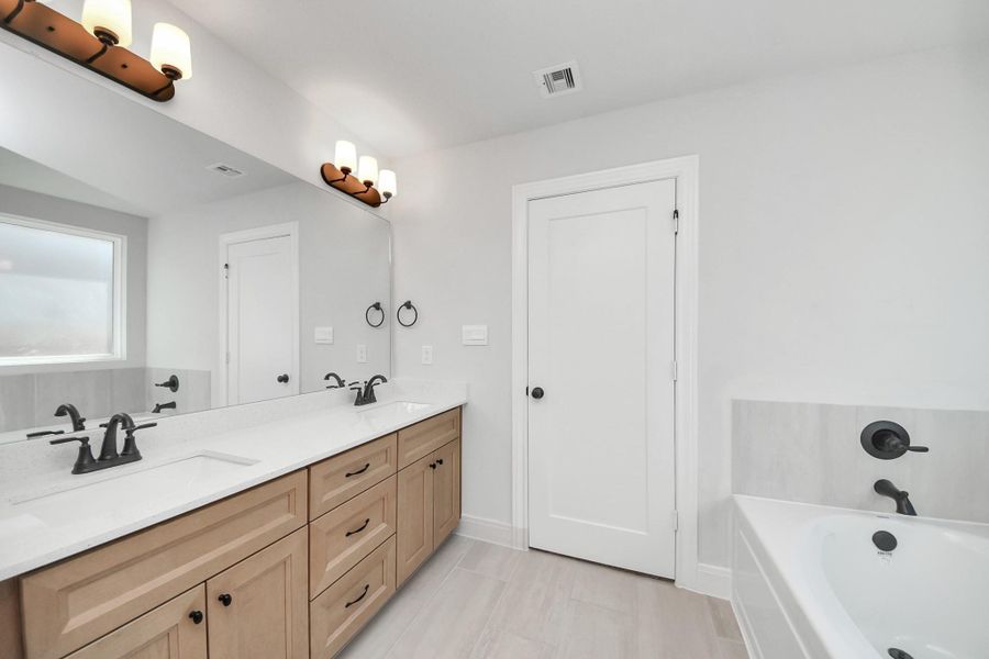 Furnished interior view inside a new home in Grand Oaks Reserve, Cleveland (Image 11).