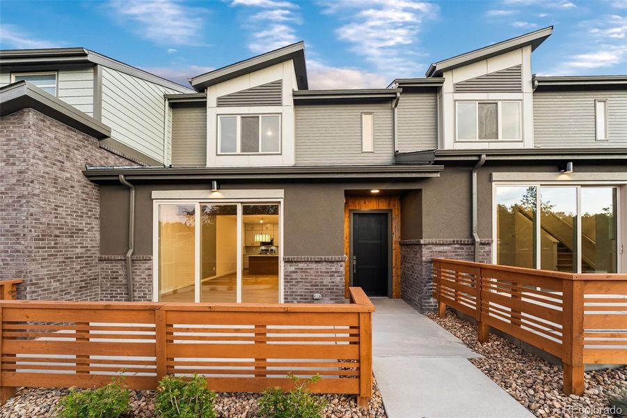 Front exterior of a new home in , Arvada, CO, highlighting curb appeal (Image 22).