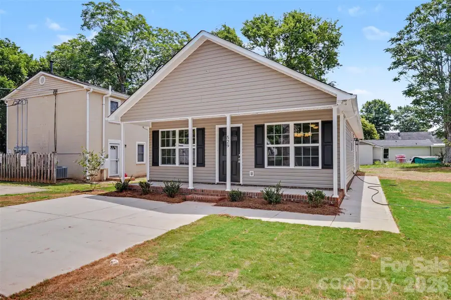 Front exterior of a new home in , Rock Hill, SC, highlighting curb appeal (Image 1). Front exterior of a new home in , Rock Hill, SC, highlighting curb appeal (Image 1).