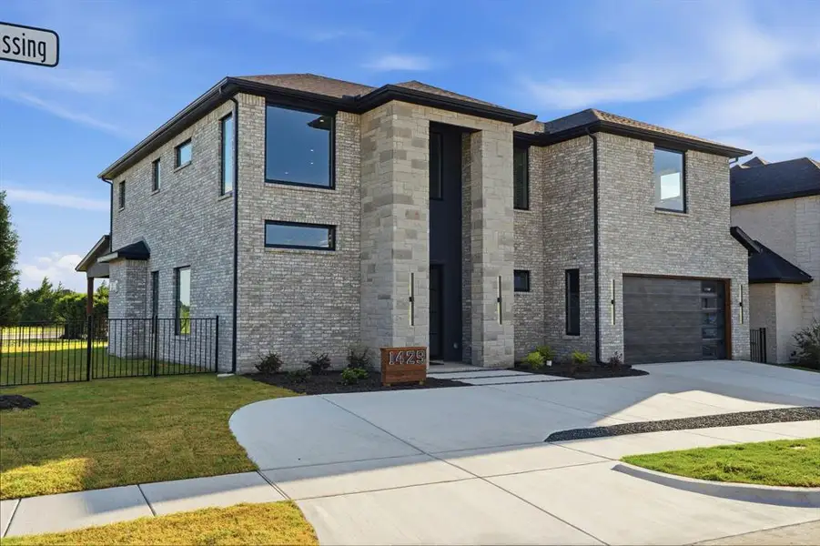 Front exterior of a new home in , Heath, TX, highlighting curb appeal (Image 1). Front exterior of a new home in , Heath, TX, highlighting curb appeal (Image 1).