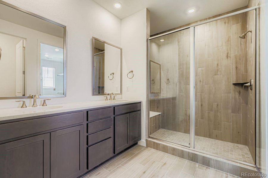 Furnished interior view inside a new home in Sunset Village: The Grand Collection, Erie (Image 5). Furnished interior view inside a new home in Sunset Village: The Grand Collection, Erie (Image 5).