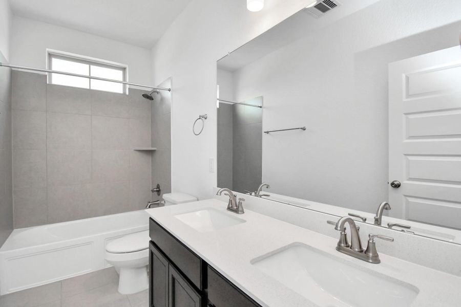 Furnished interior view inside a new home in 50' Traditional Homes at Elyson, Katy (Image 14).