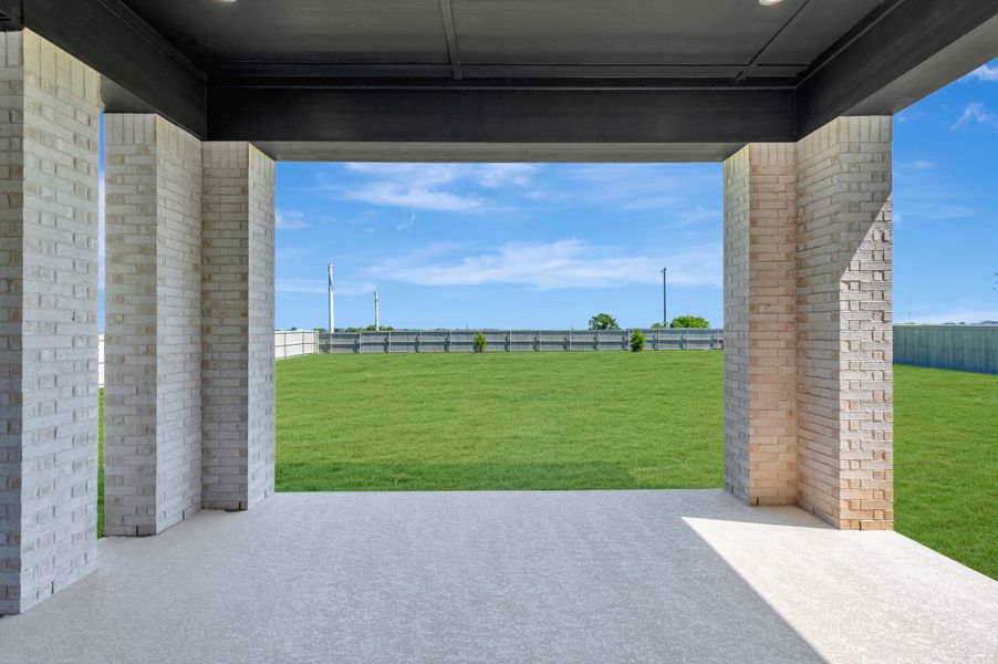 Exterior details and patio area of a home in Pecan Square - Estates, Northlake (Image 4).