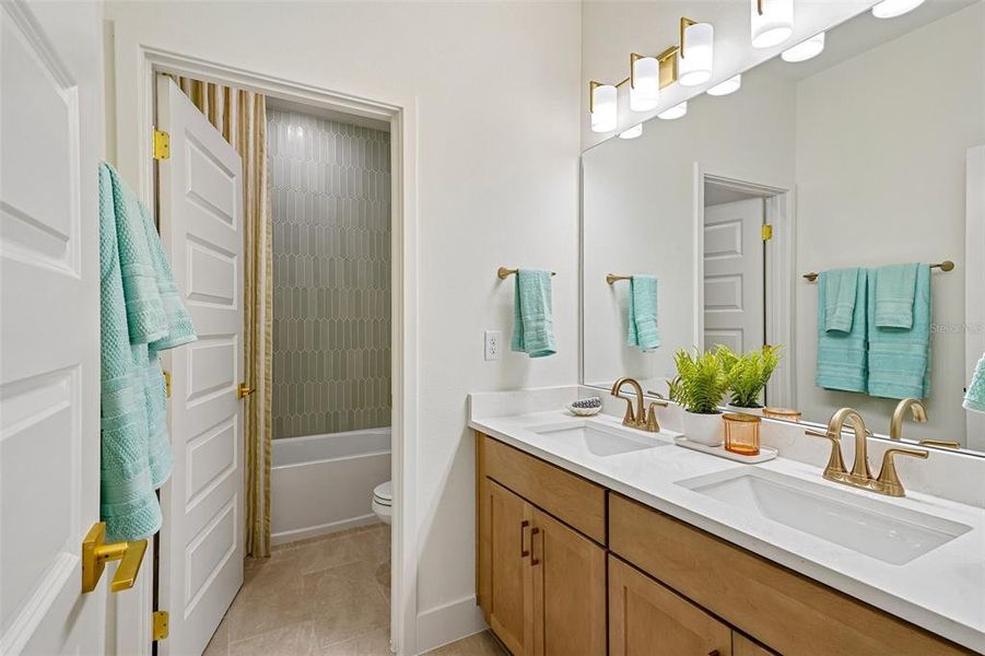 Furnished interior view inside a new home in Northlake at Ovation, Winter Garden (Image 30).