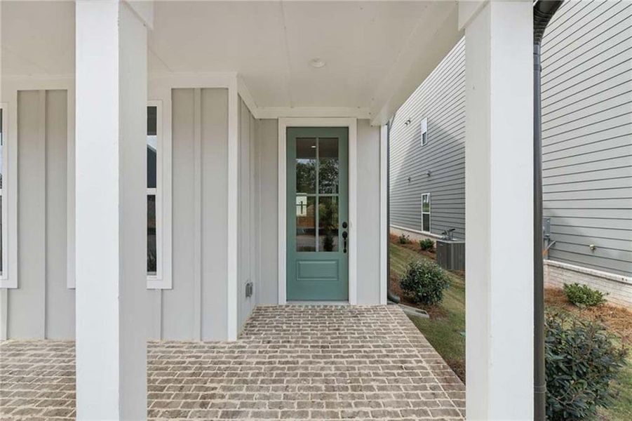 Exterior details and patio area of a home in East Harbor II at Chestatee, Dawsonville (Image 2).
