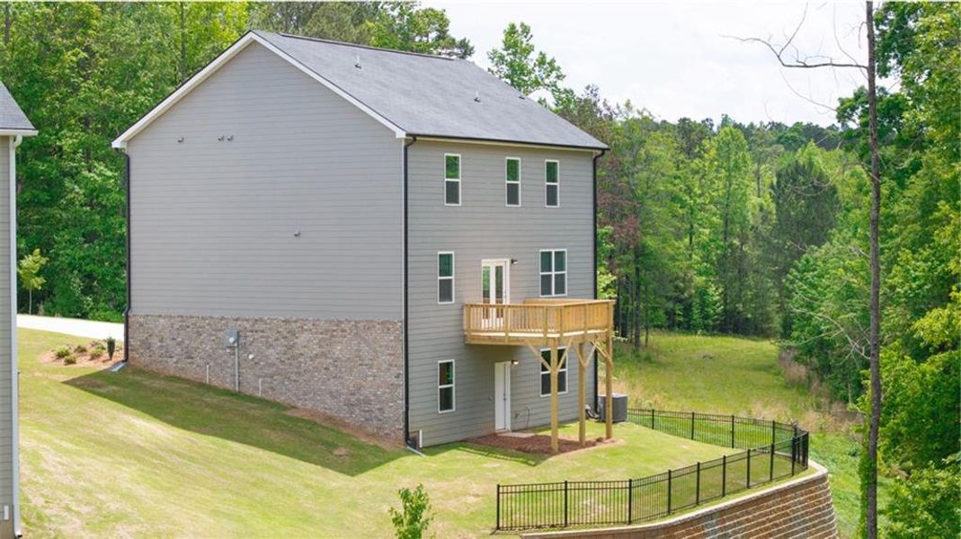 Exterior details and patio area of a home in Brooks Village, Dacula (Image 20).