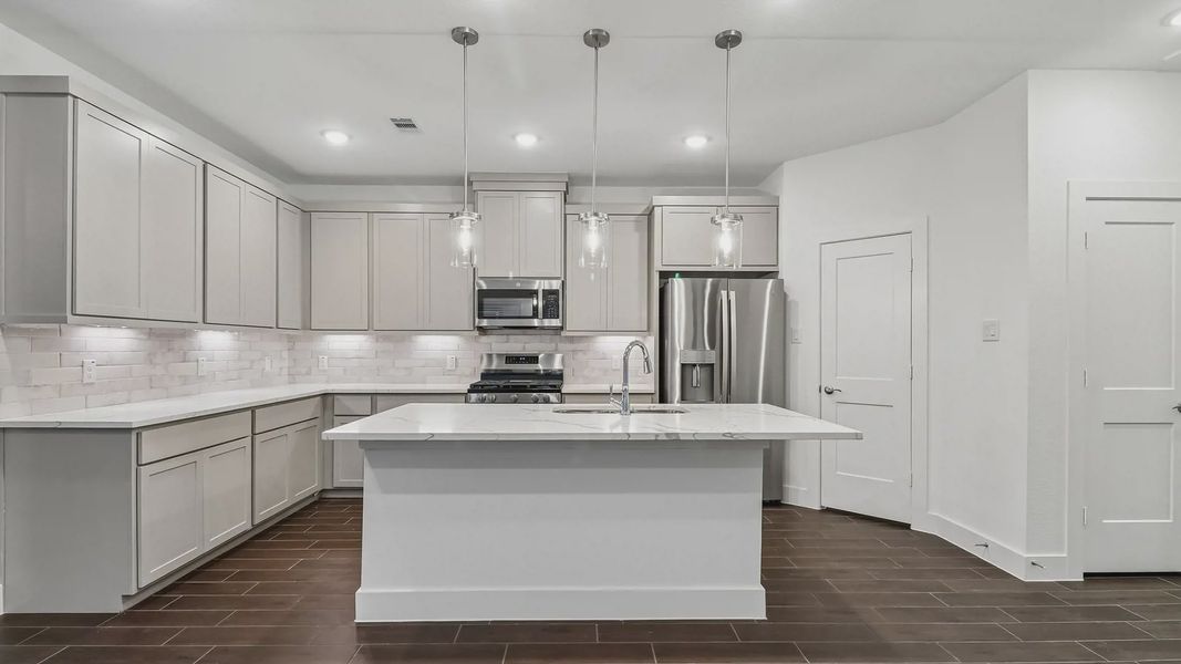 Furnished interior view inside a new home in Meridiana Townhomes, Manvel (Image 14).