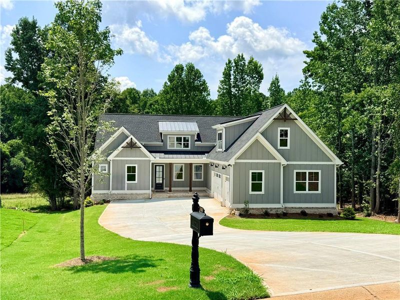 Front exterior of a new home in , Jefferson, GA, highlighting curb appeal (Image 31).
