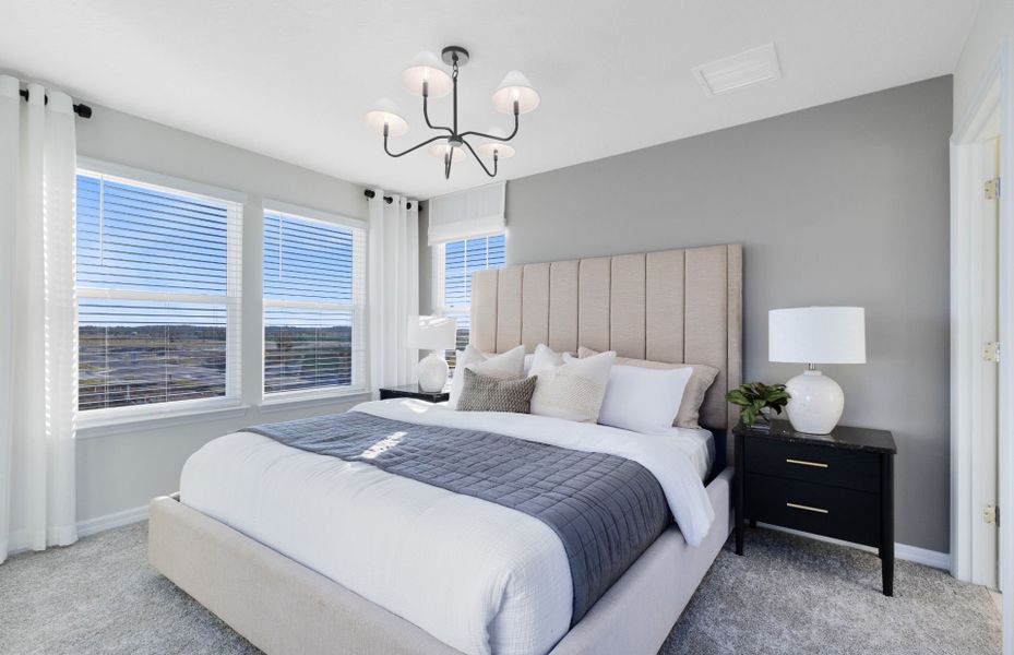 Representative furnished interior of a home built from the Mabel II by Pulte Homes in EverBe, Orlando (Image 15).