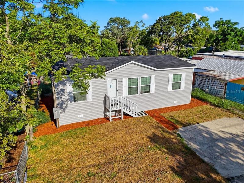 Exterior details and patio area of a home in , Port Richey (Image 22).