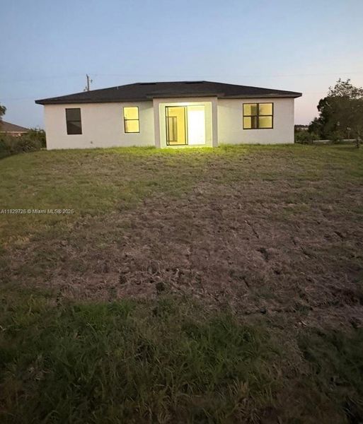 Exterior details and patio area of a home in , Lehigh Acres (Image 2).