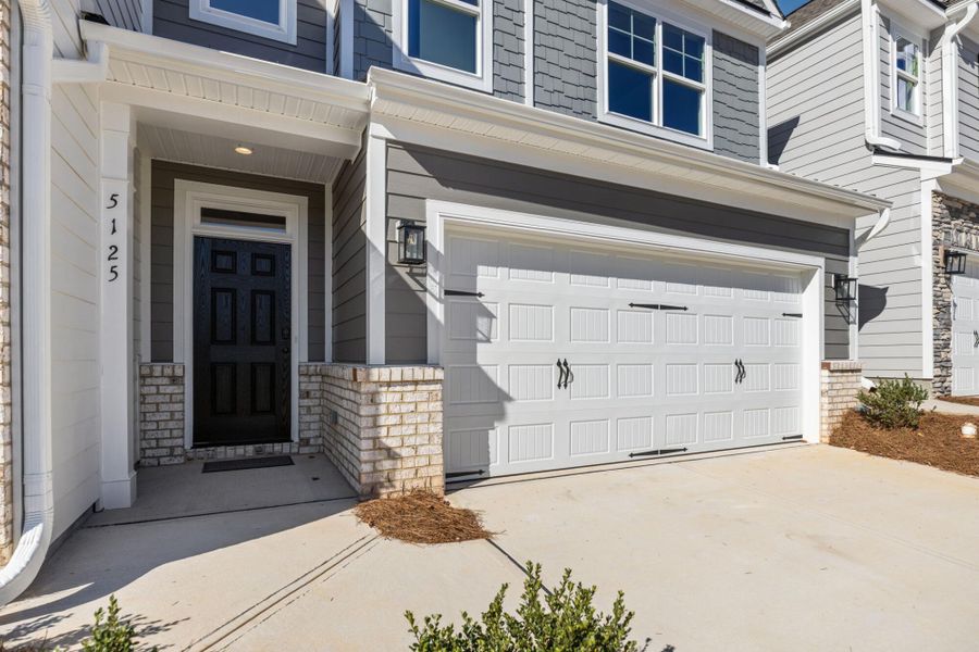 Exterior details and patio area of a home in Harbor Crossing, Greensboro (Image 3).