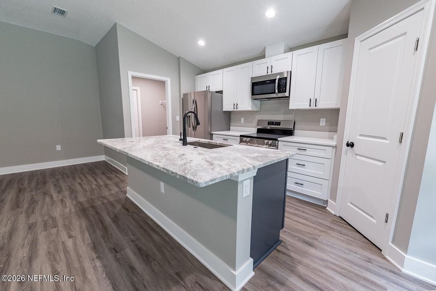 Furnished interior view inside a new home in , Florahome (Image 5).