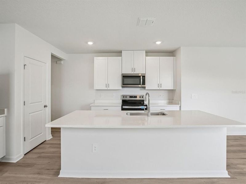 Furnished interior view inside a new home in Salt Meadows - Premier Series, Parrish (Image 9).