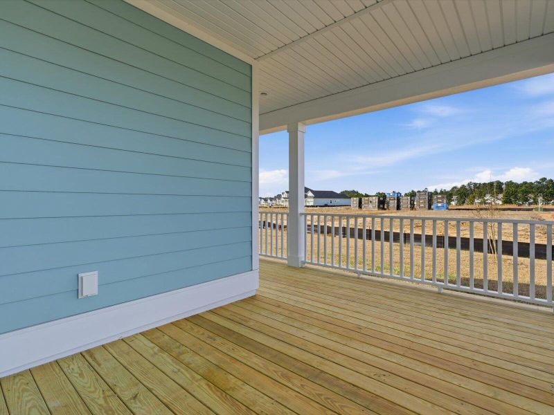 Exterior details and patio area of a home in The Coves at Lakes of Cane Bay, Summerville (Image 27).