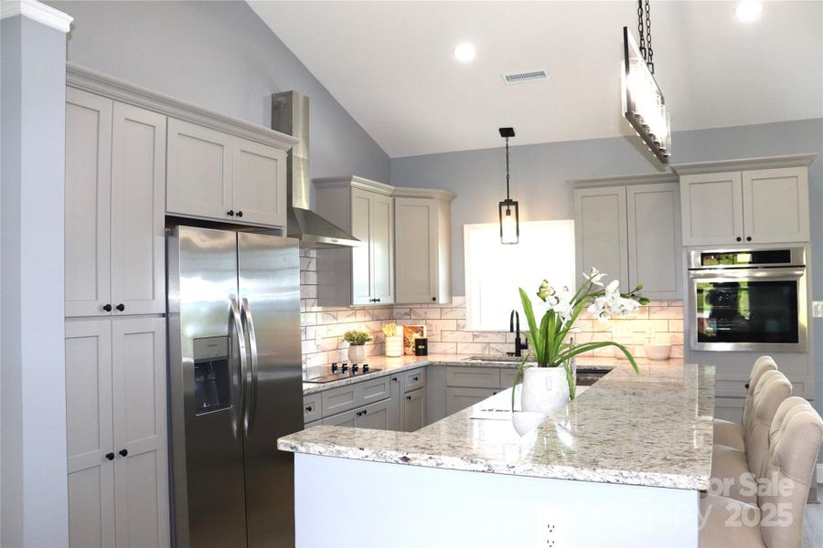 Furnished interior view inside a new home in , Lenoir (Image 15).