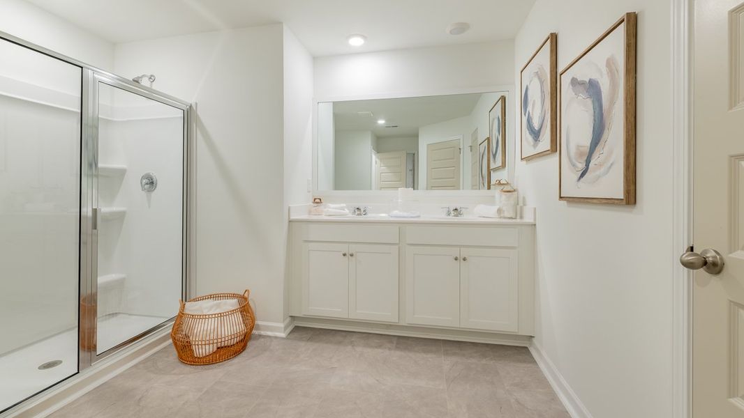 Representative furnished interior of a home built from the Stratford by D.R. Horton in Barrett Cove, Marietta (Image 22).
