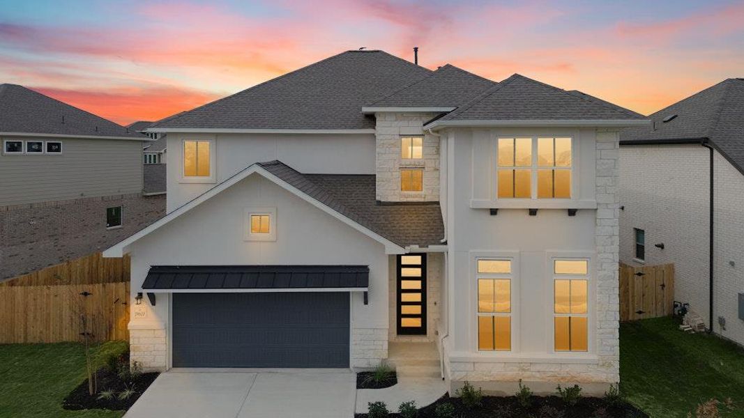 Front exterior of a new home in Blackhawk, Pflugerville, TX, highlighting curb appeal (Image 20).