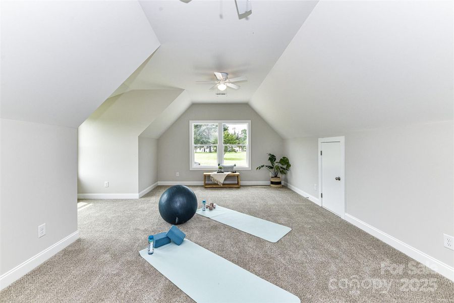 Large Bonus Room with attic storage & dual ceiling fans! Large Bonus Room with attic storage & dual ceiling fans!