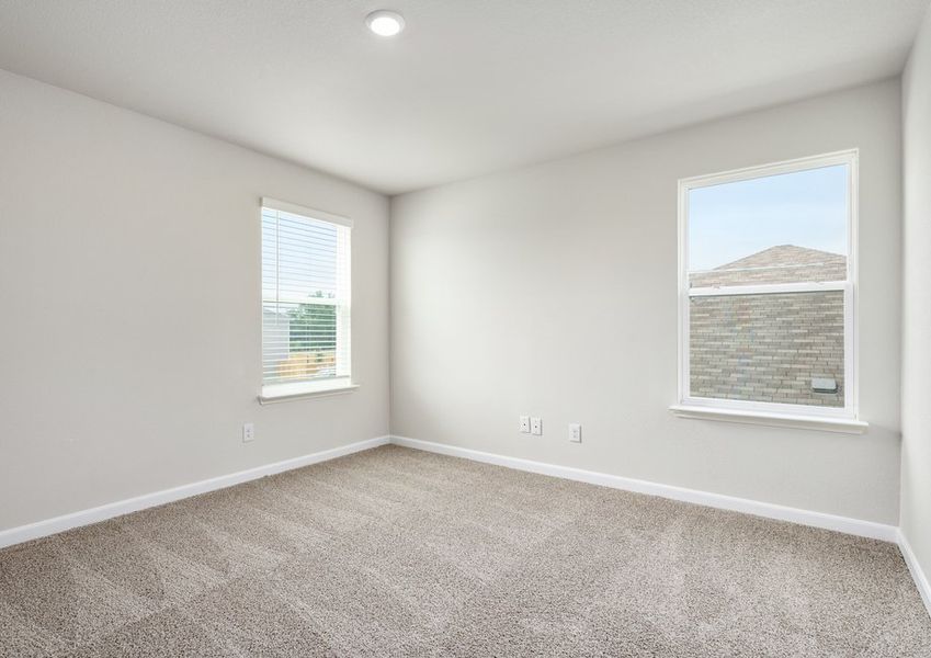 The upstairs loft is large and has large windows. The upstairs loft is large and has large windows.