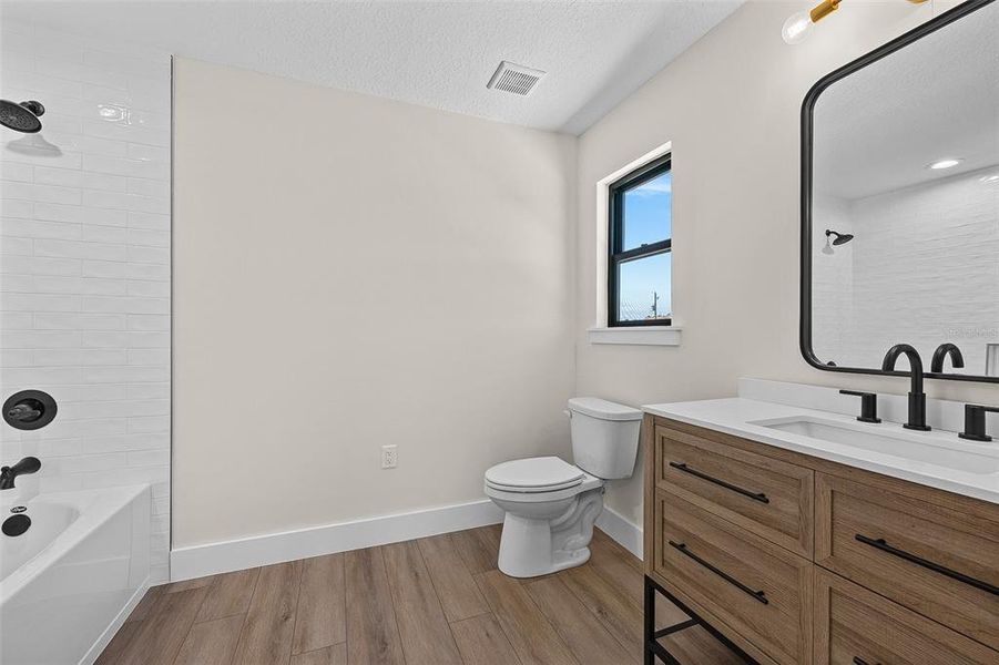 Furnished interior view inside a new home in , Lake City (Image 33).