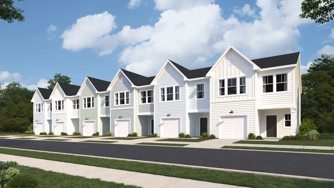 Front exterior of a new home in Lindera Preserve at Cane Bay Plantation: Townhomes, Summerville, SC, highlighting curb appeal (Image 1). Front exterior of a new home in Lindera Preserve at Cane Bay Plantation: Townhomes, Summerville, SC, highlighting curb appeal (Image 1).