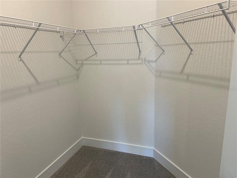 Spacious, unfurnished interior of a new home in Watercress Cove, North Port (Image 16).