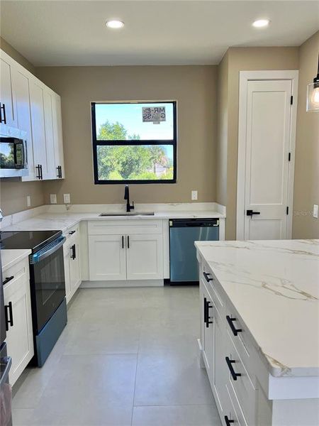 Furnished interior view inside a new home in , Port Charlotte (Image 9).