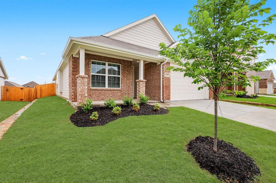 Front exterior of a new home in Retreat at Fossil Creek, Fort Worth, TX, highlighting curb appeal (Image 13).
