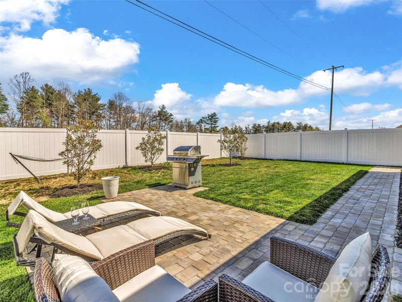 New pavers patio with walkway to gate that seller installed last year.