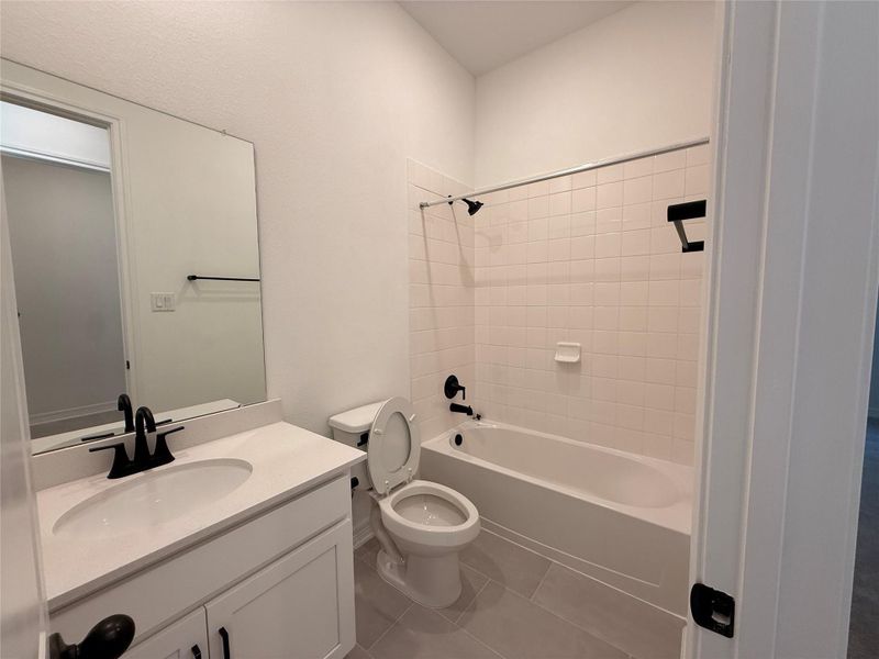 Furnished interior view inside a new home in Wildrye, Waller (Image 4).