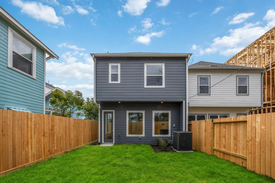 With a fully fenced backyard and a freshly landscaped lawn, this home makes outdoor living feel easy. Just add string lights and a bistro table.