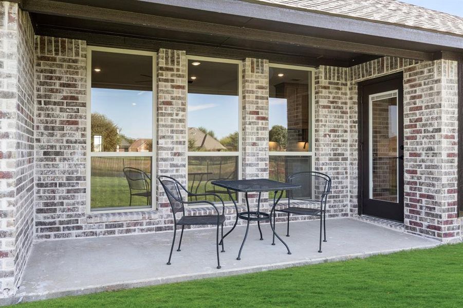 Exterior details and patio area of a home in Abe's Landing, Granbury (Image 26).