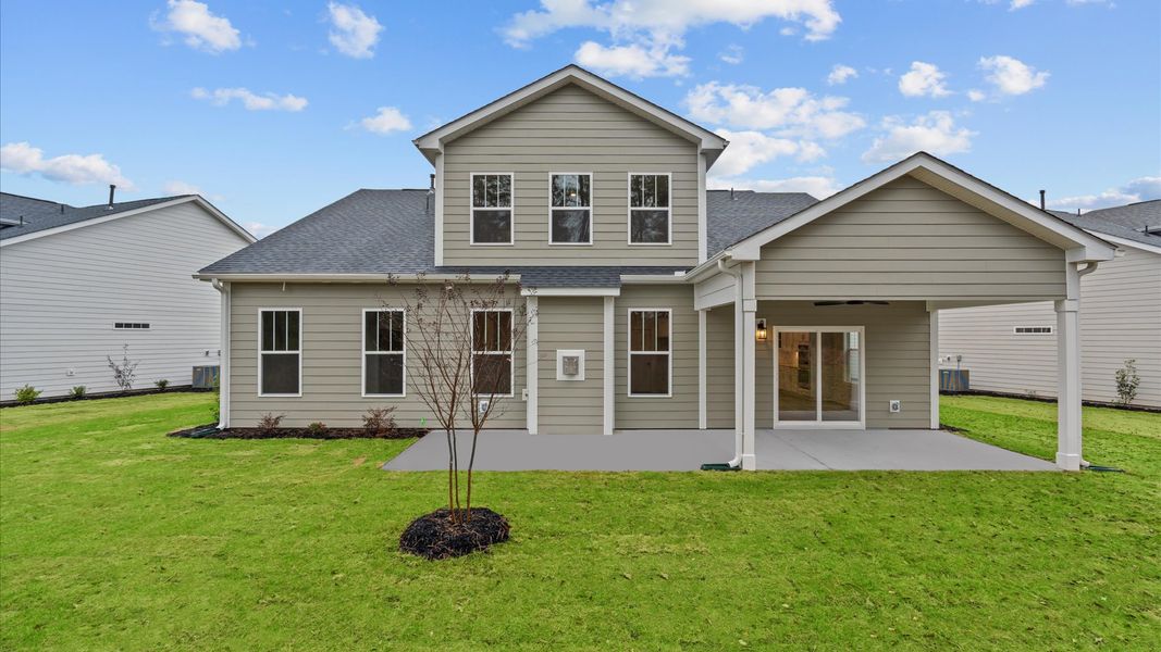 Elegant exterior with a rear covered porch perfect for relaxing or entertaining outdoors