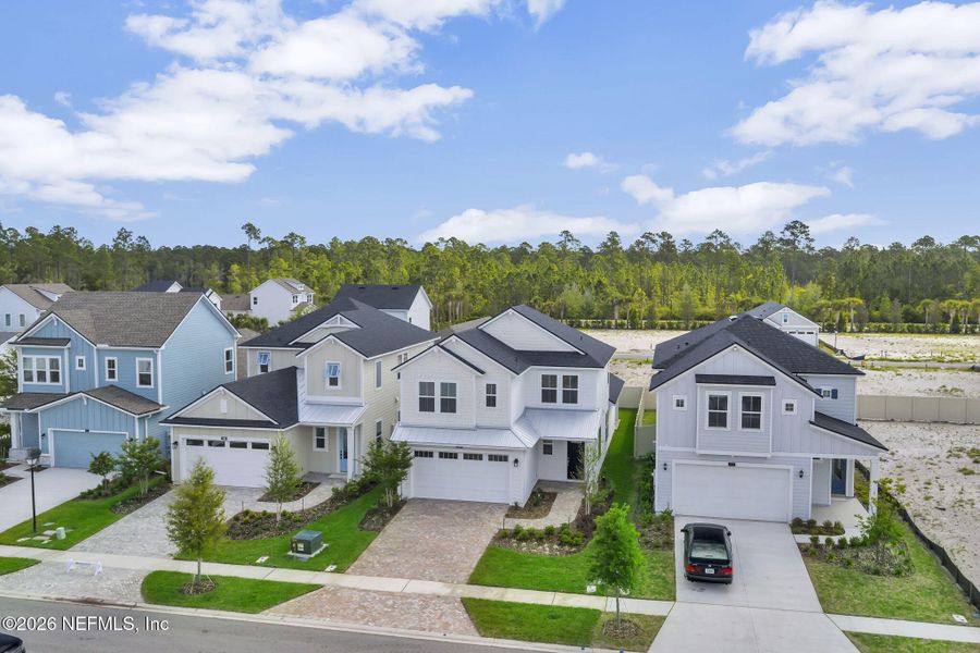 Front exterior of a new home in Seabrook Village at Seabrook, Nocatee, FL, highlighting curb appeal (Image 24).