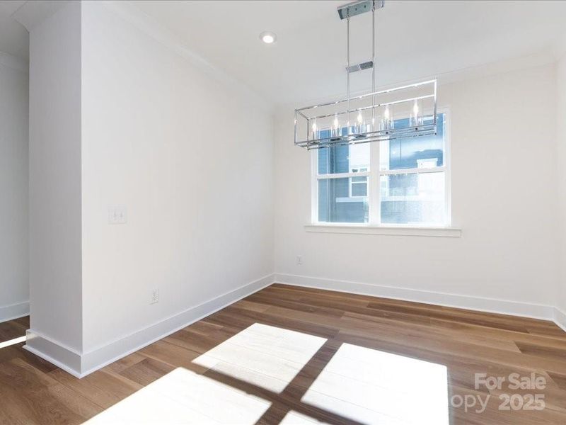 Dining Space with Modern Chandelier Dining Space with Modern Chandelier