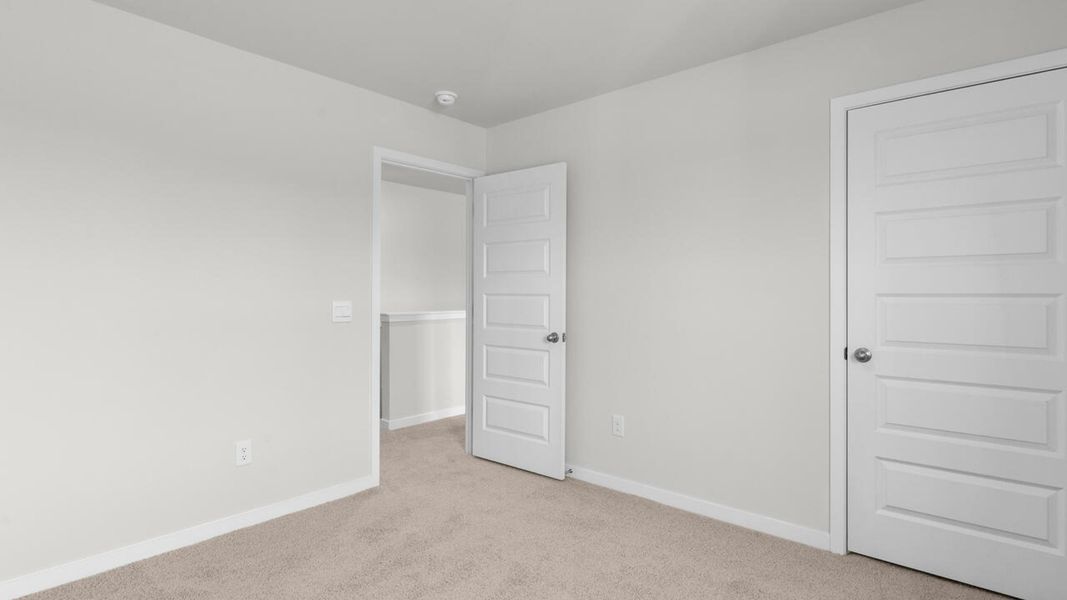 Spacious, unfurnished interior of a new home in Sidbury Station, Castle Hayne (Image 28).