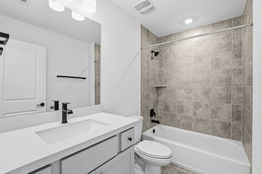 Furnished interior view inside a new home in Travisso, Leander (Image 9).