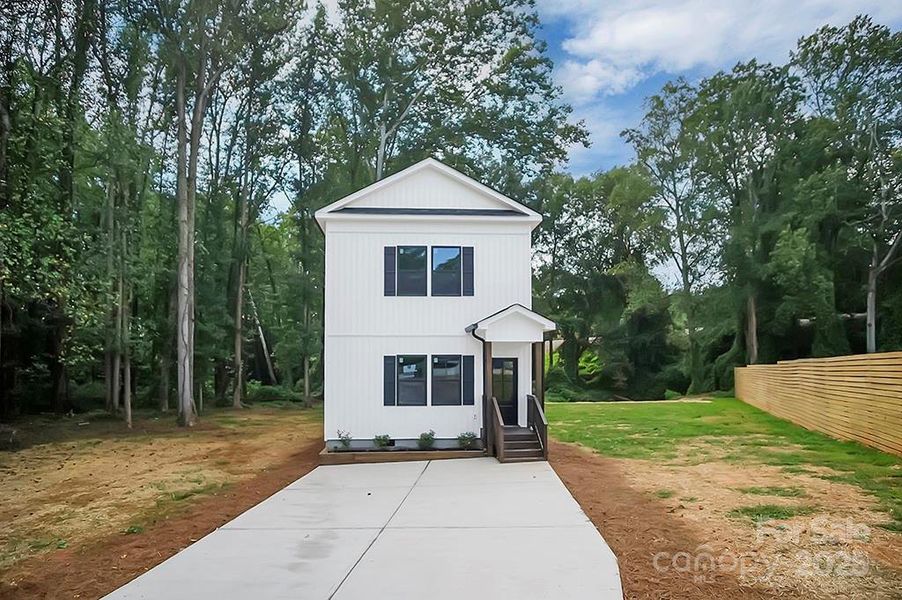 Front exterior of a new home in , Shelby, NC, highlighting curb appeal (Image 21).