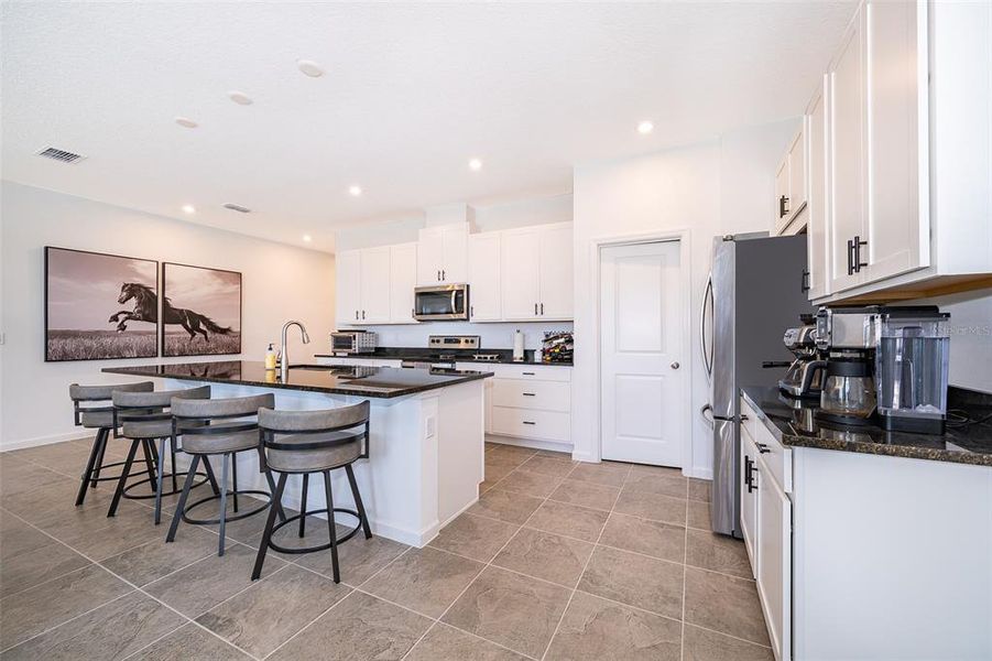 Furnished interior view inside a new home in , Kissimmee (Image 3).