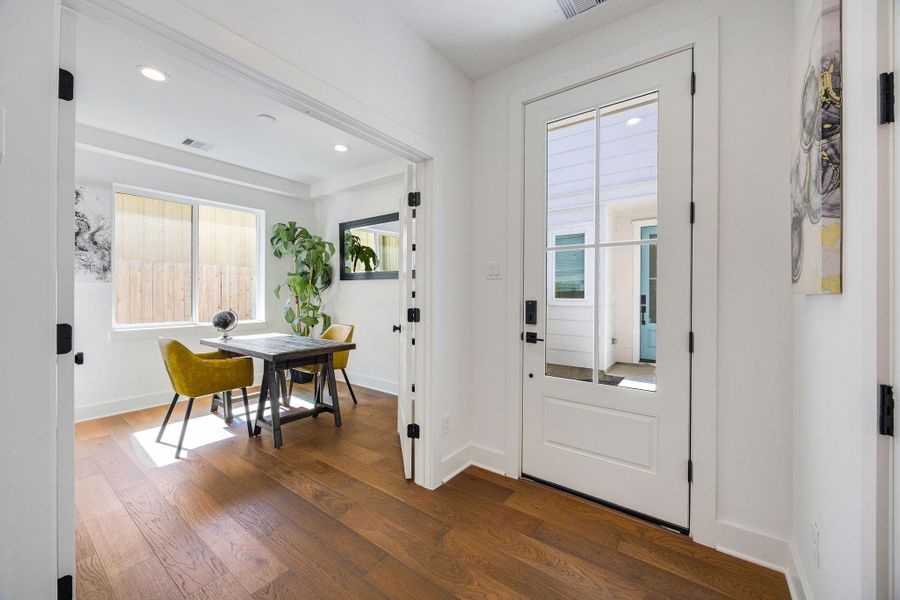 Front foyer and third bedroom pictured.