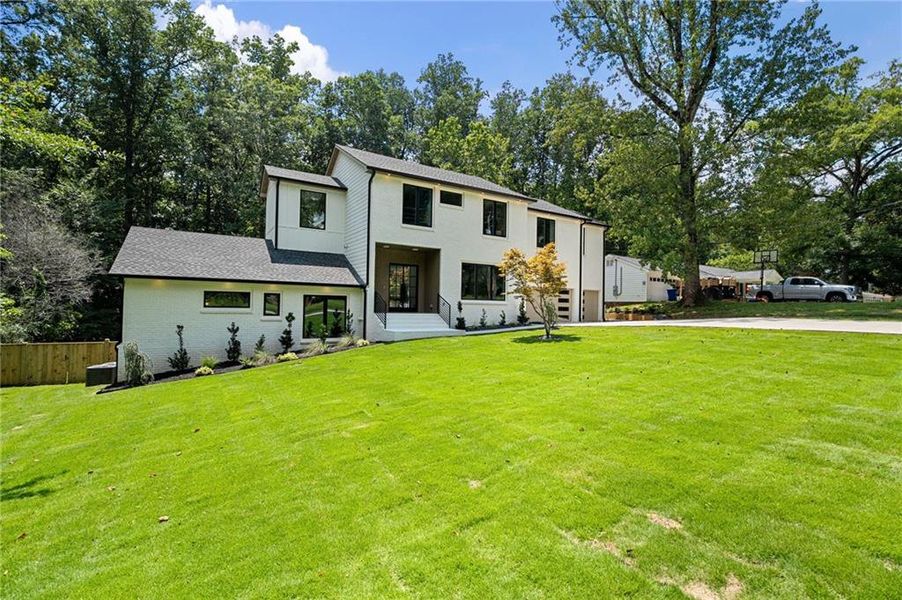 Front exterior of a new home in , Atlanta, GA, highlighting curb appeal (Image 37). Front exterior of a new home in , Atlanta, GA, highlighting curb appeal (Image 37).