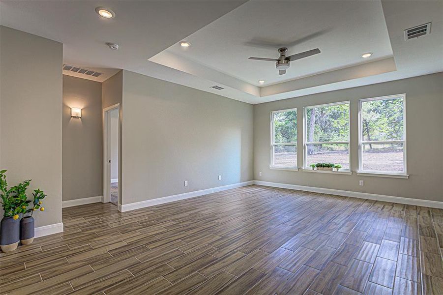 Living area with raised ceiling.