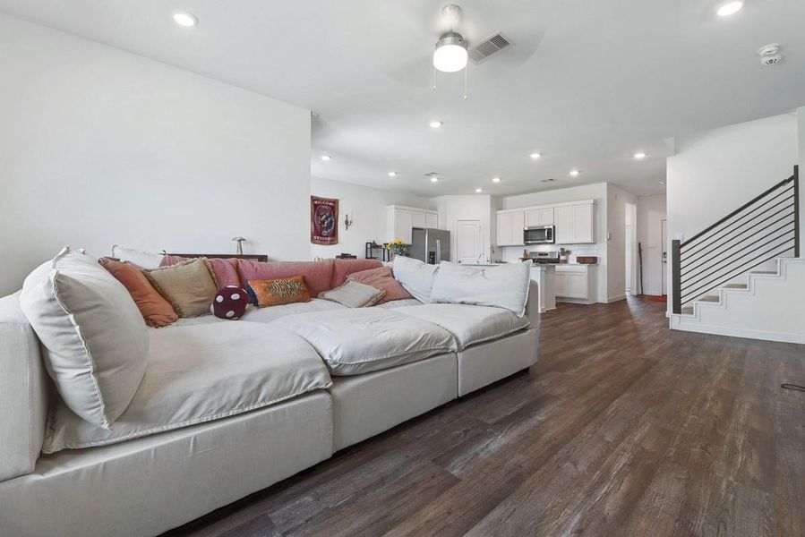 The open living space allows for the welcoming flow of living, kitchen and dining areas!