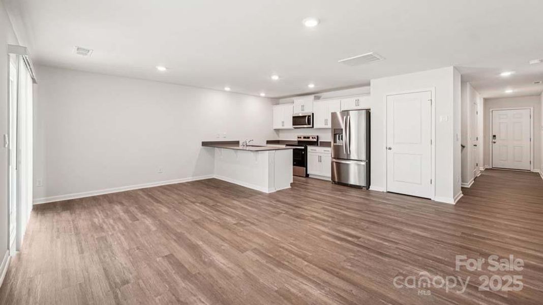 Spacious, unfurnished interior of a new home in Mallard Creek Townhomes, Charlotte (Image 18). Spacious, unfurnished interior of a new home in Mallard Creek Townhomes, Charlotte (Image 18).