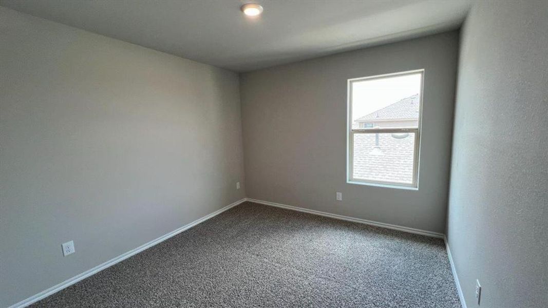 Spacious, unfurnished interior of a new home in Monarch at the Meadows, Ponder (Image 14).